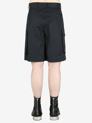 Black shorts worn by a person, showing the shorts fit