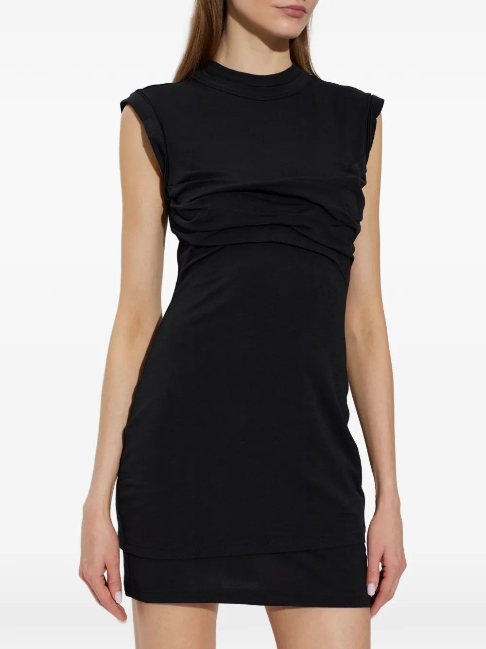 Black dress worn by a person, showing the dress fit