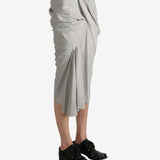 Grey skirt worn by a person, showing the skirt's fit