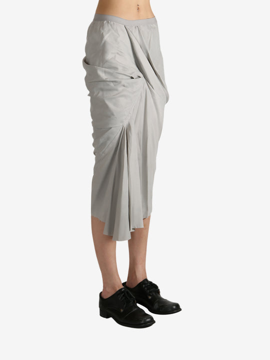 Grey skirt worn by a person, showing the skirt's fit