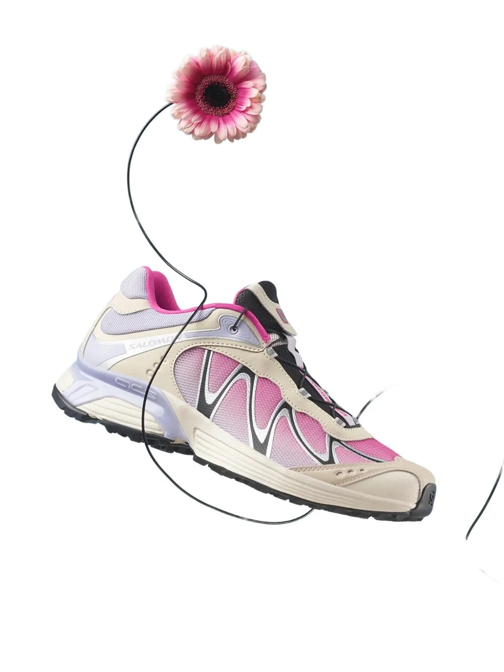 Cloes-up of pink sneaker, showing texture of the fabric