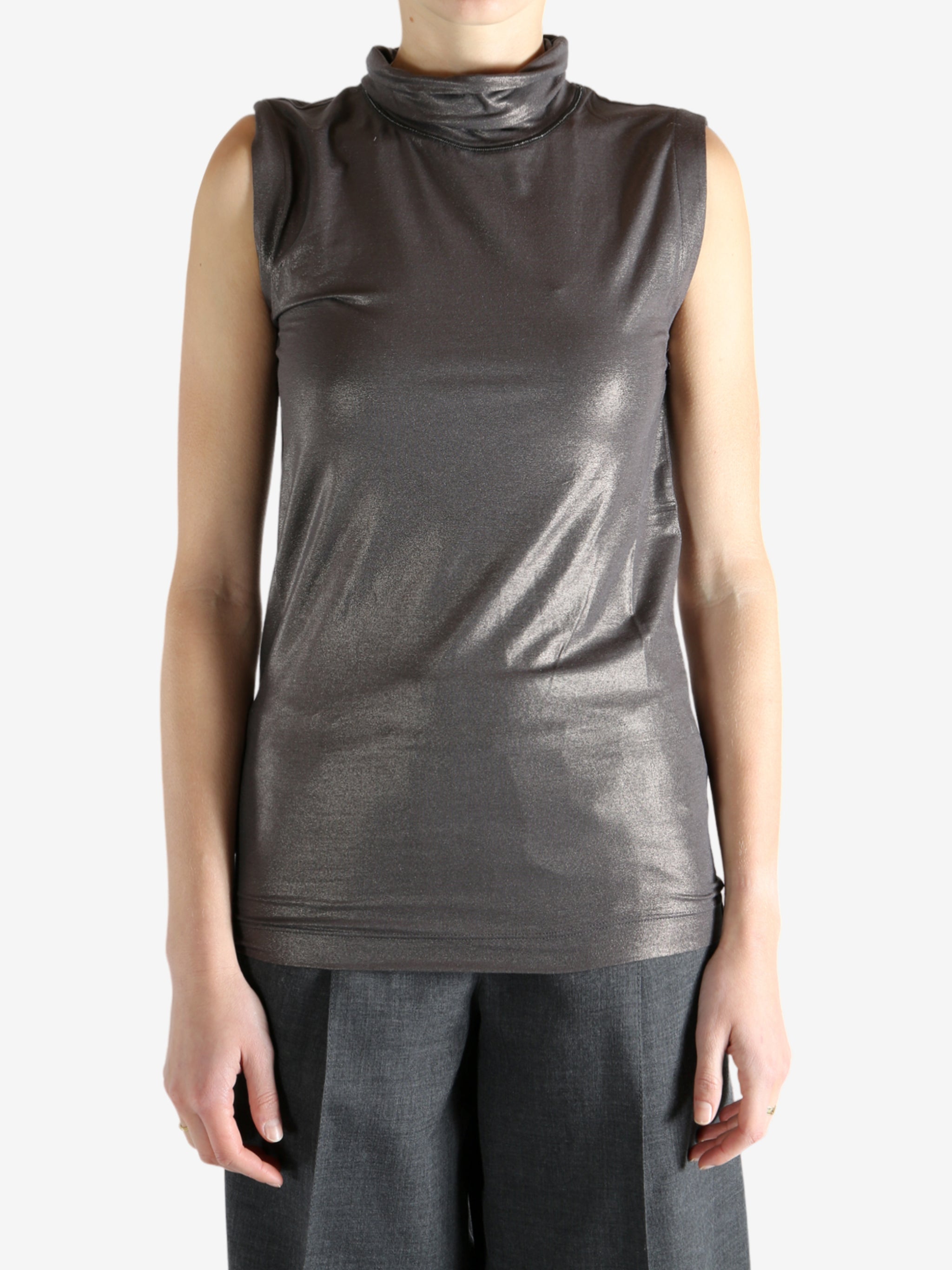 Grey tops worn by a person, showing the tops fit