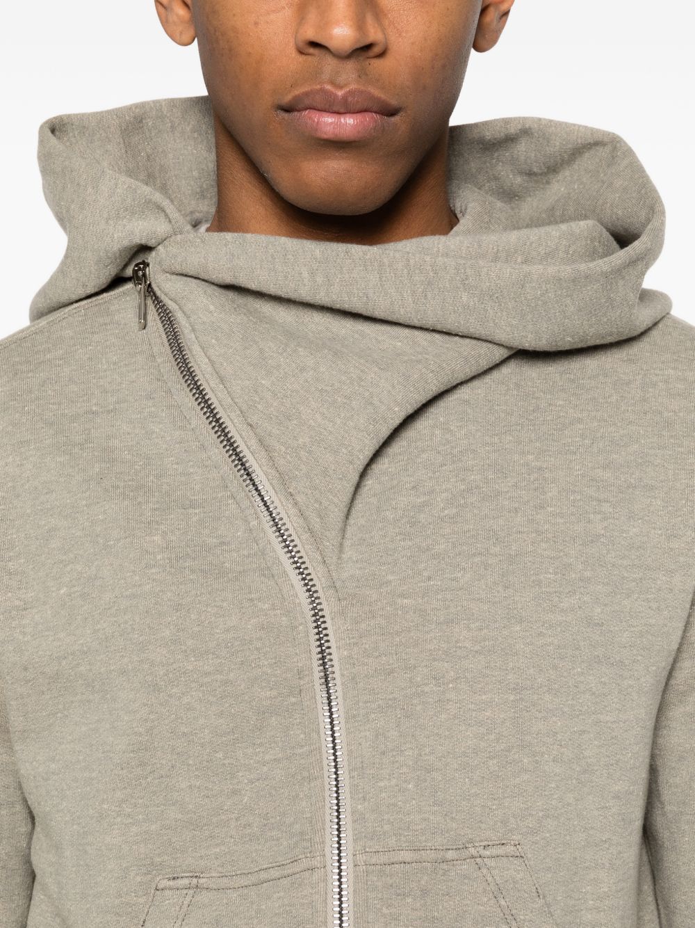 Close up of grey hoodies, showing texture of the cotton fabric
