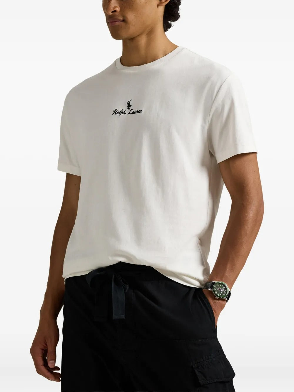 White shirt worn by a person, showing the shirt's fit