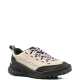 Tan sneakers, side view