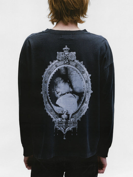 Black shirts worn by a person, showing the shirts fit