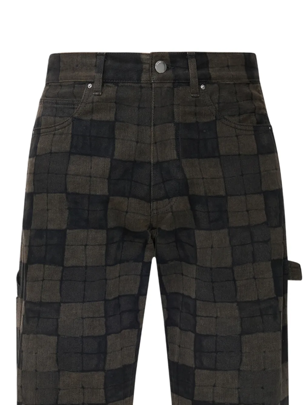 close up of brown jeans, showing texture of the cotton fabric