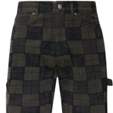 close up of brown jeans, showing texture of the cotton fabric