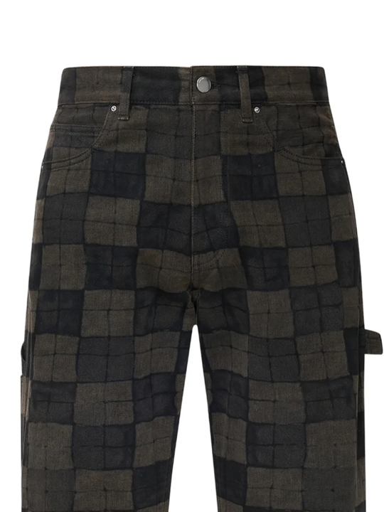 close up of brown jeans, showing texture of the cotton fabric