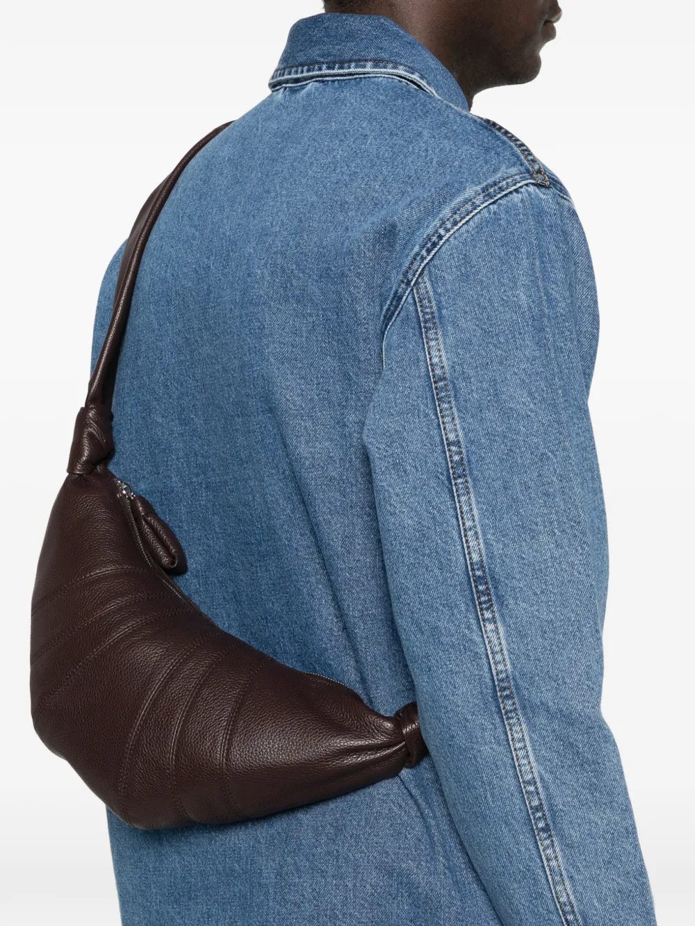 Brown bag worn by a person, showing the bag's fit