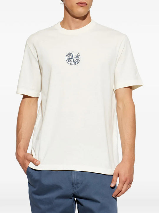 Tan t-shirt worn by a person, showing the t-shirt fit