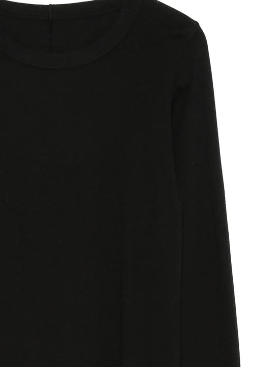 Close up of black top, showing texture of the cotton fabric