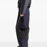 brown bags worn by a person, showing the bags fit