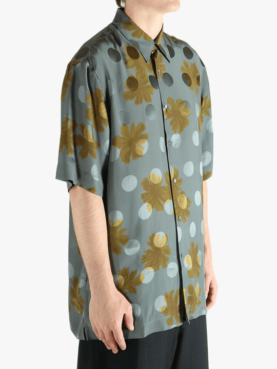 Navy shirt worn by a person, showing the shirt's fit