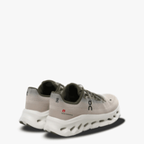 Tan sneakers, back view