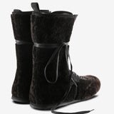 Brown boots, back view