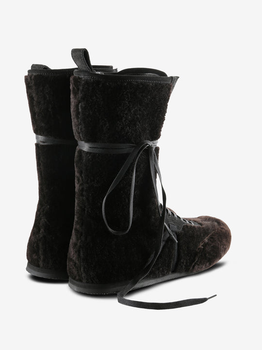 Brown boots, back view