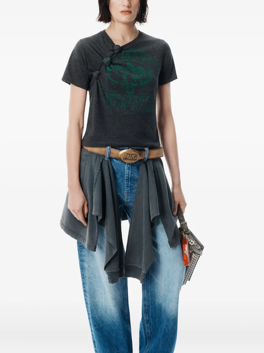 Black t-shirt worn by a person, showing the t-shirt's fit