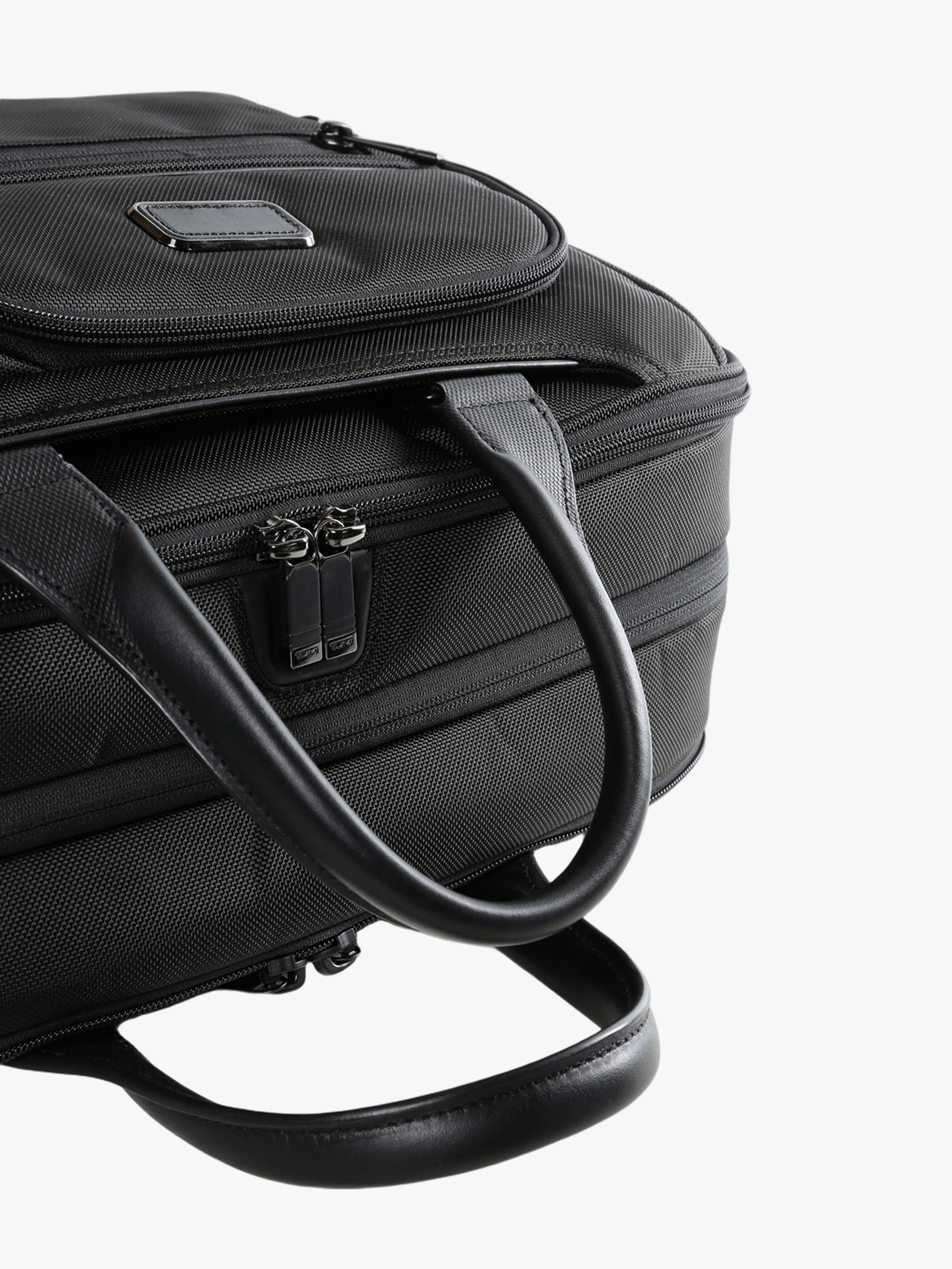 Close up of the black bag, showing texture of the nylon fabric