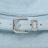 Close up of blue bags, showing texture of the suede cow leather fabric