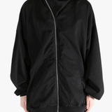 black sweats-hoodies worn by a person, showing the sweats-hoodies  fit