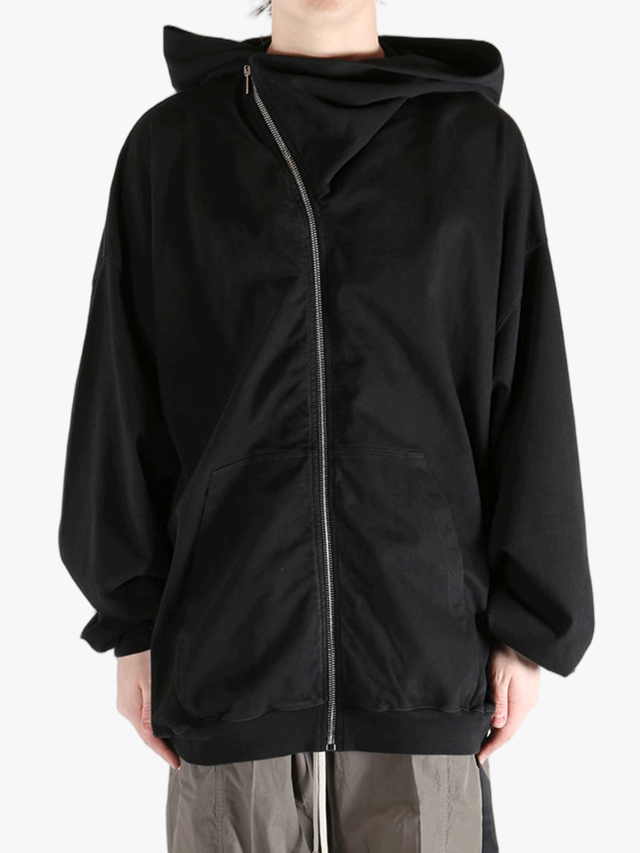 black sweats-hoodies worn by a person, showing the sweats-hoodies  fit