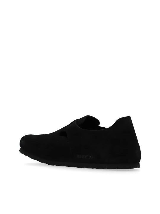 Black flat, back view