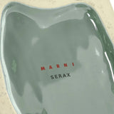 Close up of the blue vase, showing texture of the stone fabric