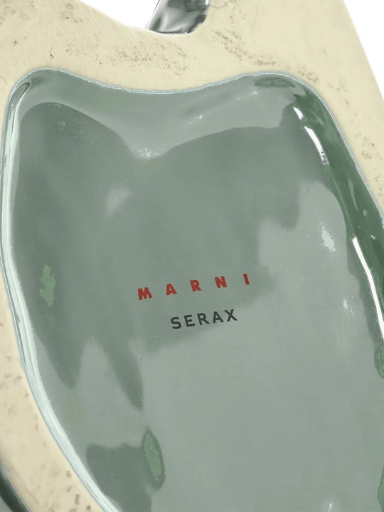 Close up of the blue vase, showing texture of the stone fabric