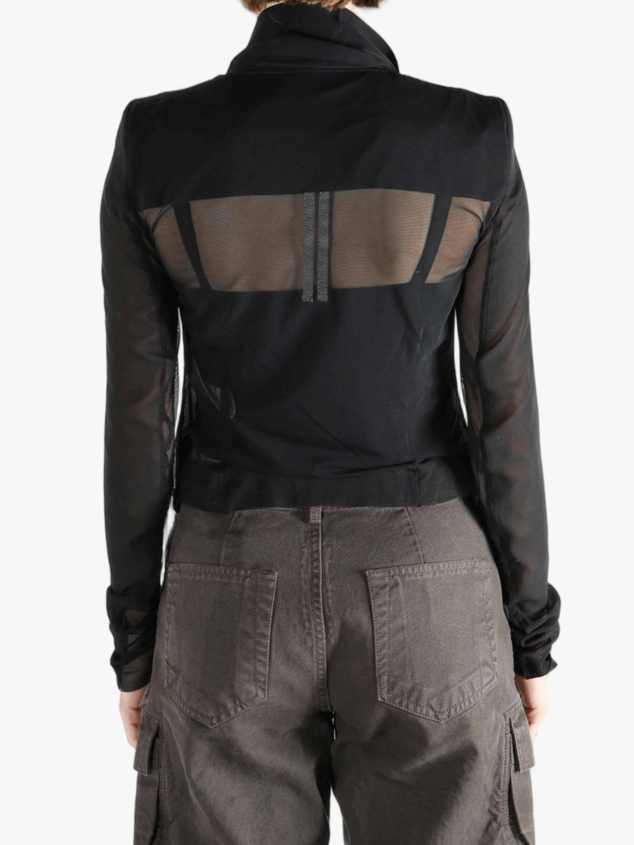 Black long sleeve worn by a person, showing the tight fit.