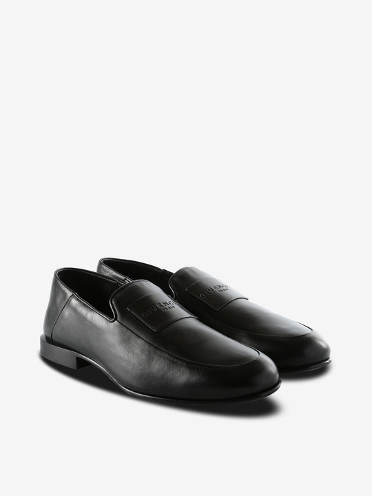 Black loafers,side view