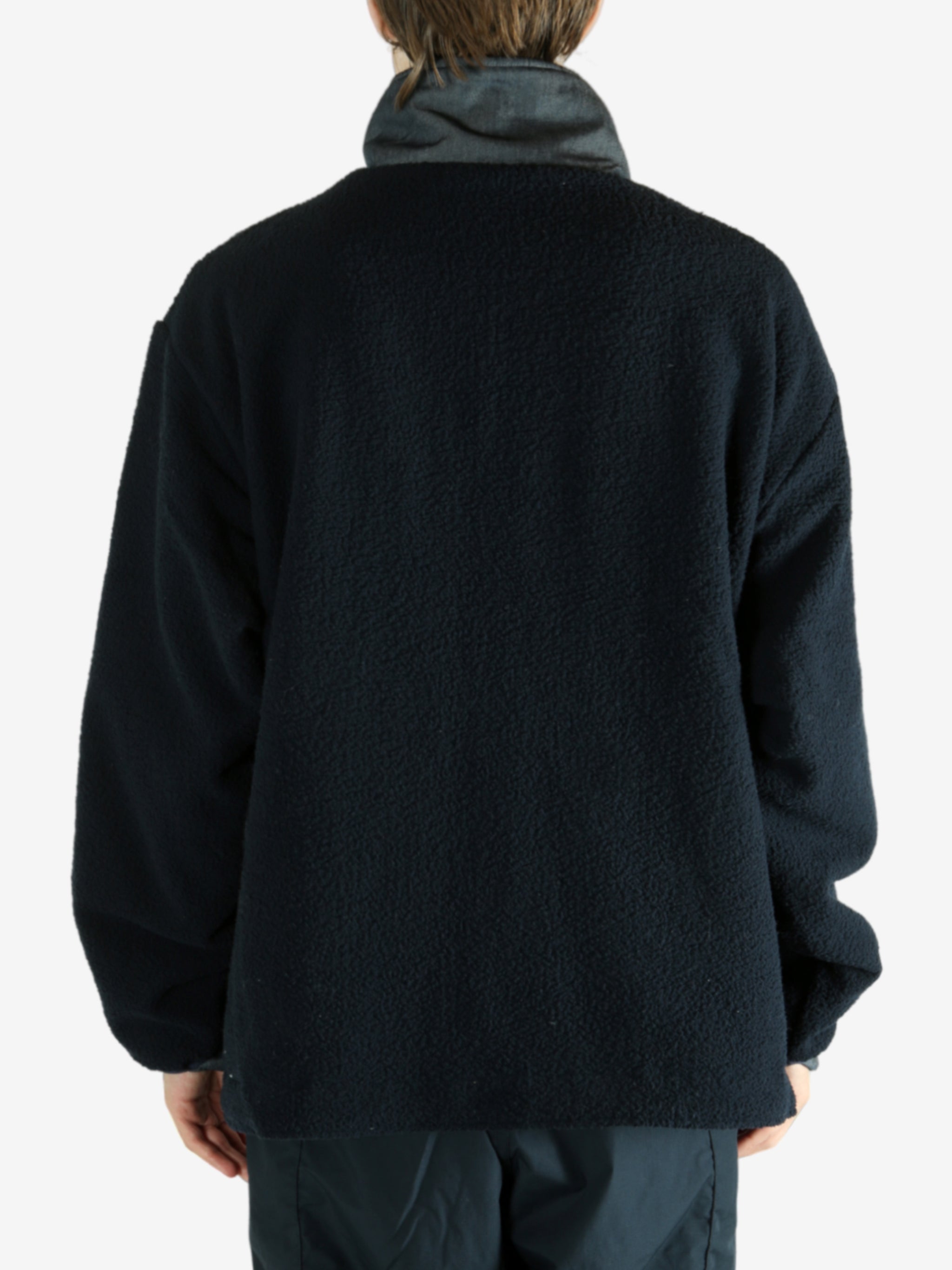 Navy jacket worn by a person, showing the jacket's fit