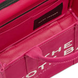 Close up of pink bag, showing zip fastening