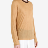 Tan t-shirt worn by a person, showing the t-shirt fit