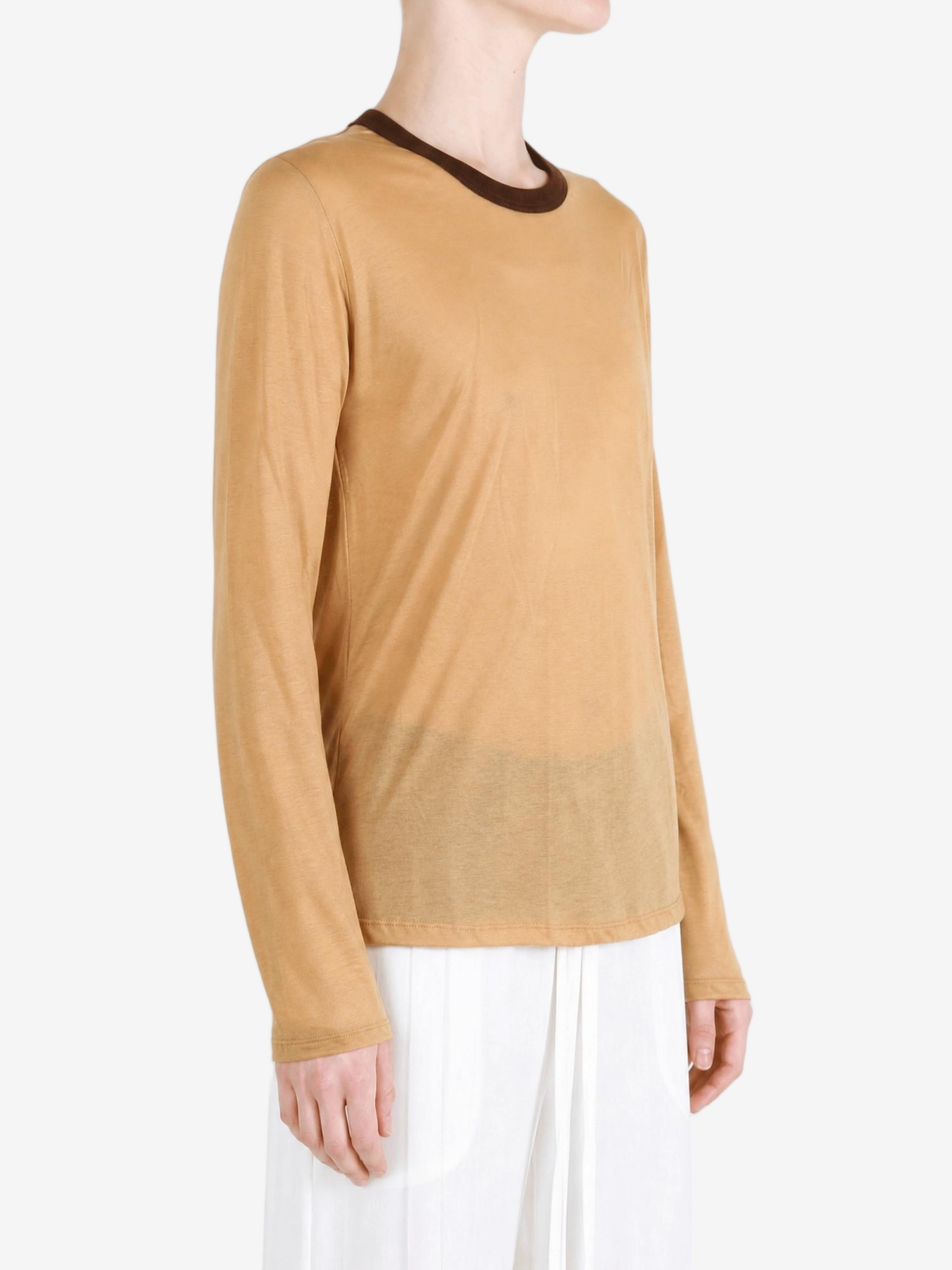 Tan t-shirt worn by a person, showing the t-shirt fit