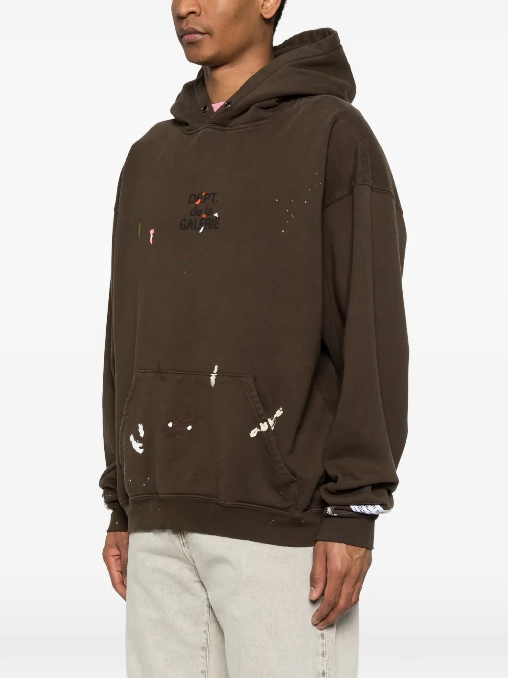 Brown hoodies worn by a person, showing the hoodies fit