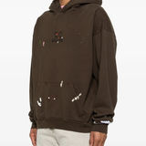 Brown hoodies worn by a person, showing the hoodies fit