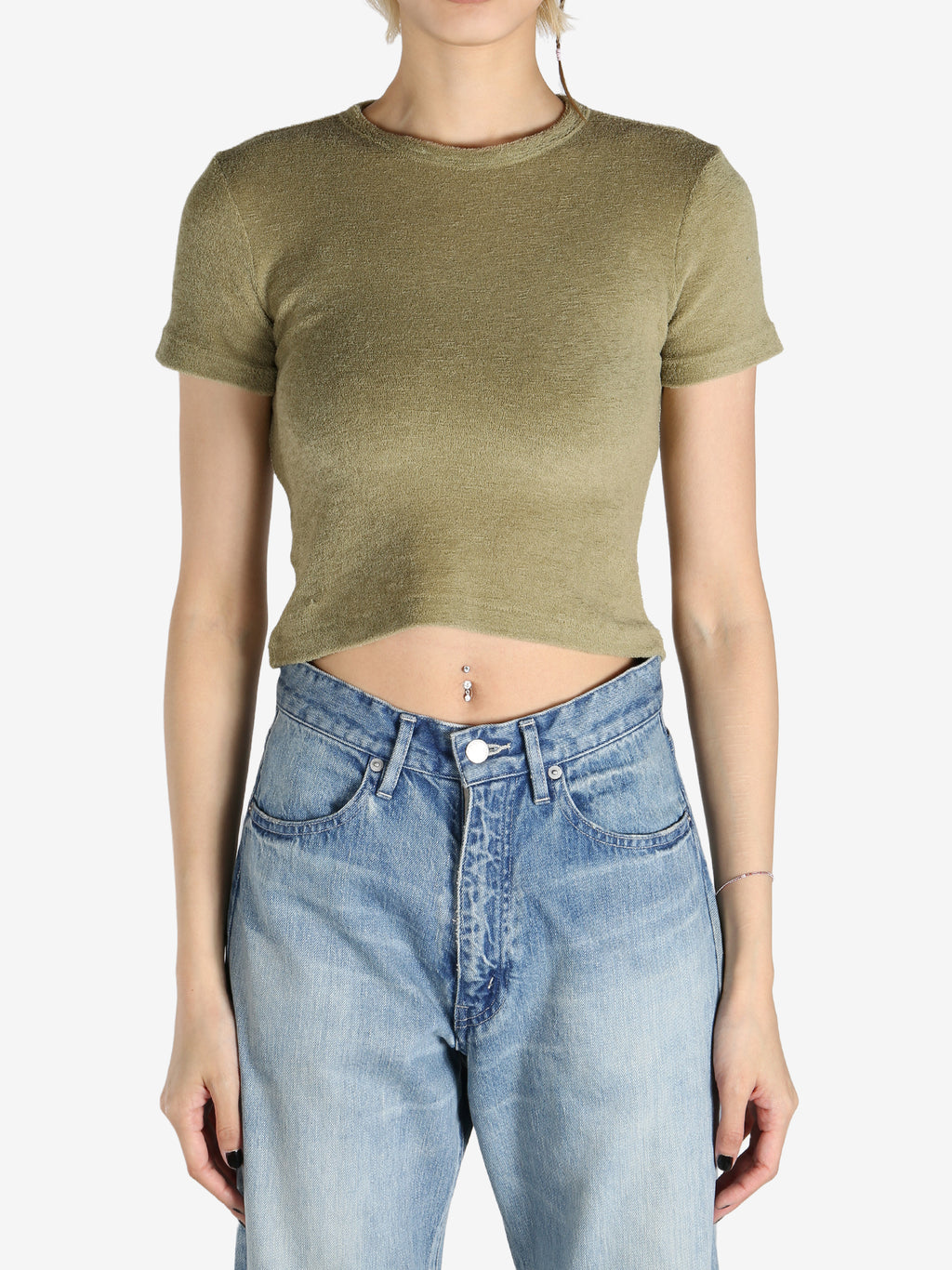 Green T-shirt worn by a person, showing the shirt's fit