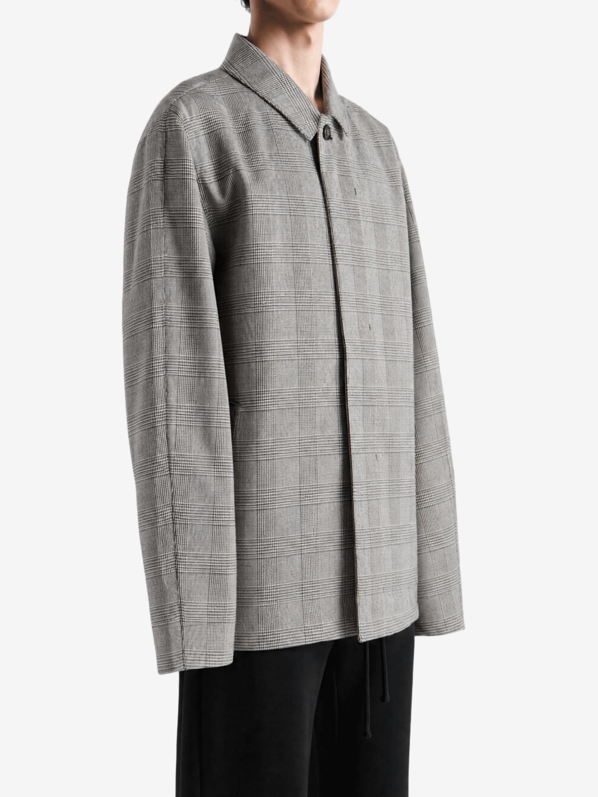 Grey jacket worn by a person, showing the jacket fit