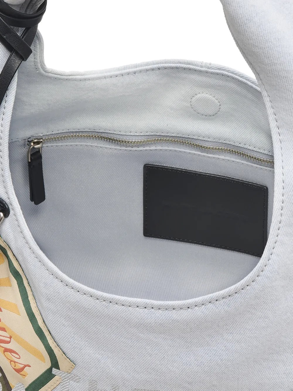 Close up of white bag, showing texture of the cotton fabric