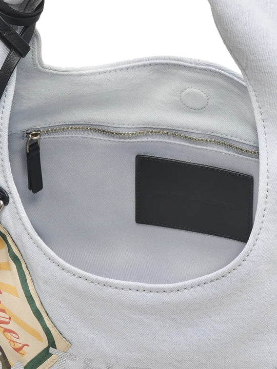 Close up of white bag, showing texture of the cotton fabric