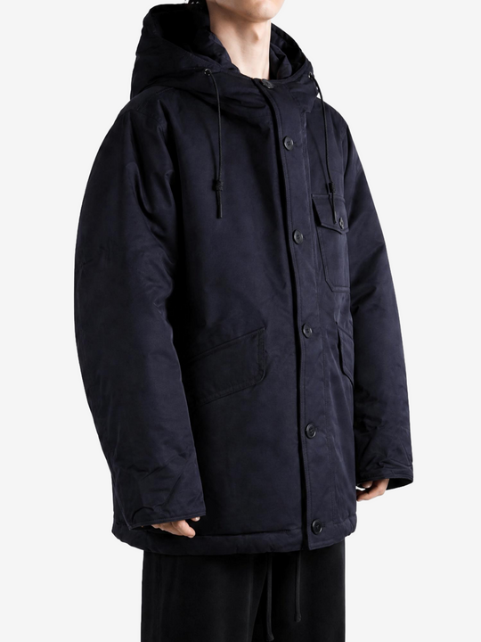 Navy jacket worn by a person, showing the jacket fit