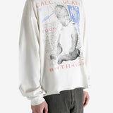 White t-shirt worn by a person, showing the t-shirt's fit