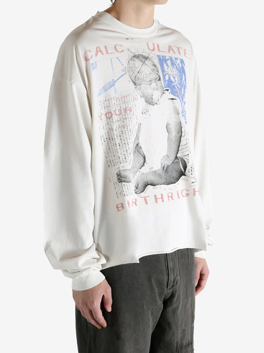 White t-shirt worn by a person, showing the t-shirt's fit