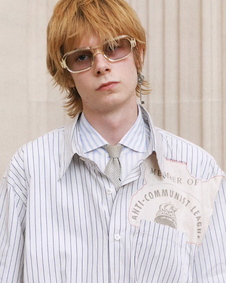 Blue shirt worn by a person, showing the shirt fit