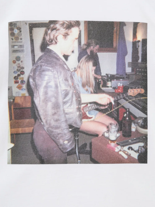 Close up of the white t-shirt, showing texture of the cotton fabric