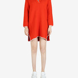 Orange dresses worn by a person, showing the dress's fit