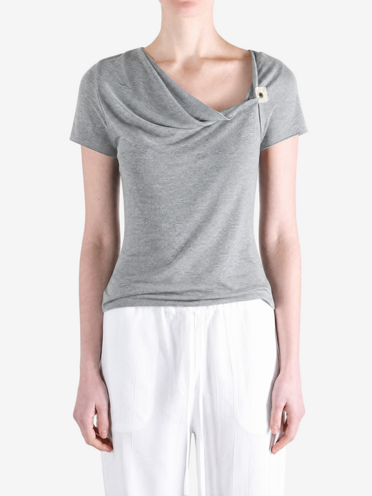 Grey top worn by a person, showing the top fit
