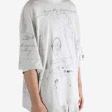 Grey T-shirt worn by a person, showing the T-shirt's fit