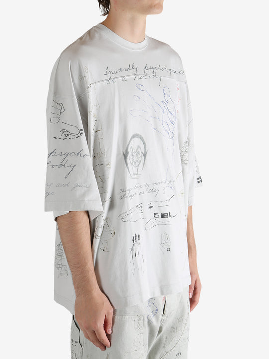 Grey T-shirt worn by a person, showing the T-shirt's fit